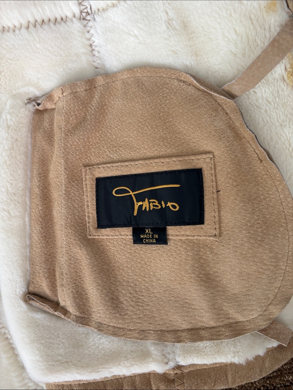 “FABIO”. Leather suede coat.